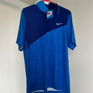 Large blue Nike golf shirt